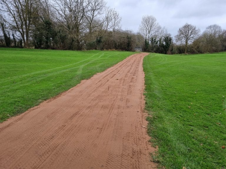 Preparation to turf 11th hole track