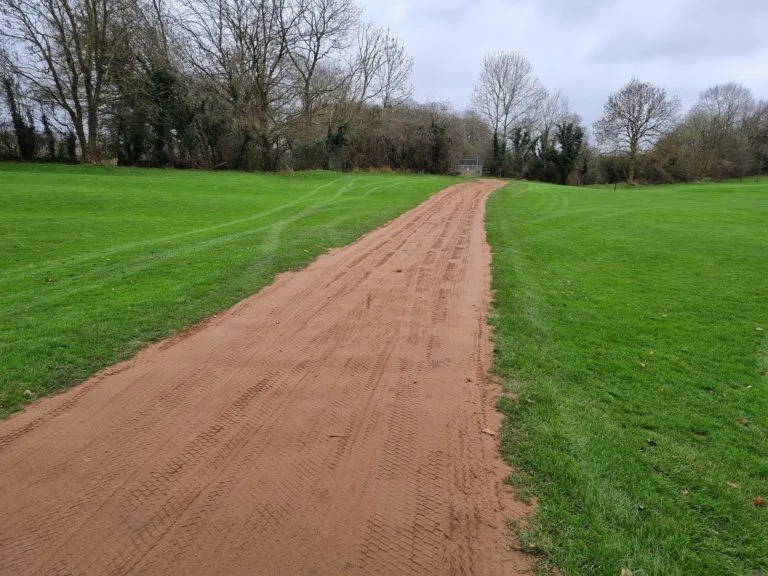 Preparation to turf 11th hole track